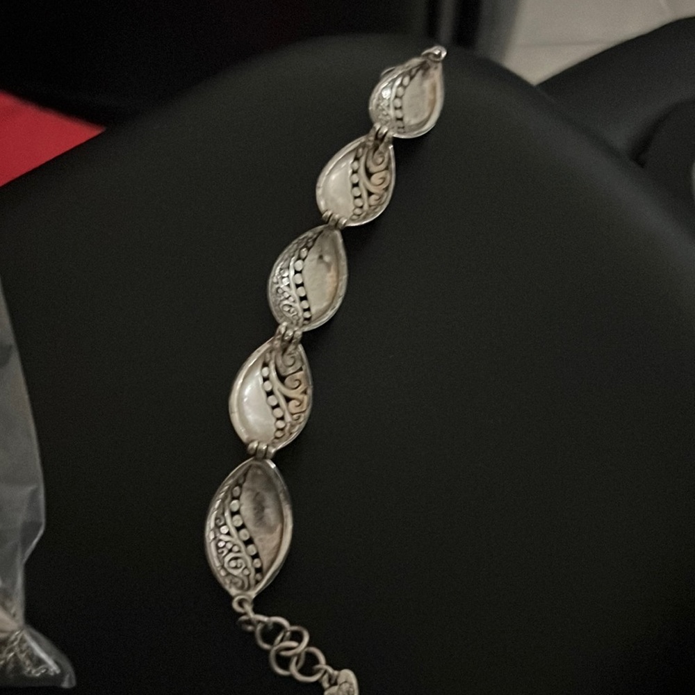 Brighton love affair scroll open silver bracelet.